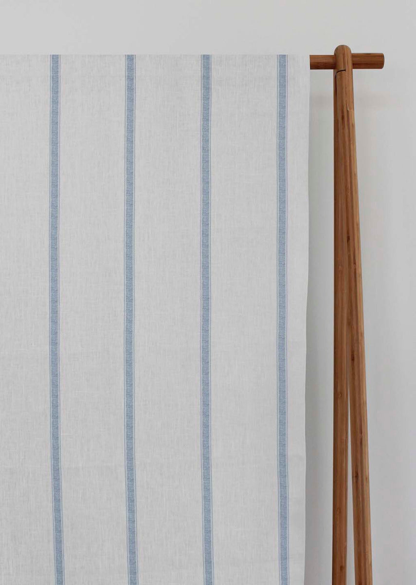 Rune Agate Blue - vertical blue tone striped fabric.