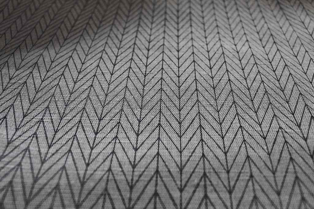 Ollie Noir Curtain fabric, abstract black herringbone pattern