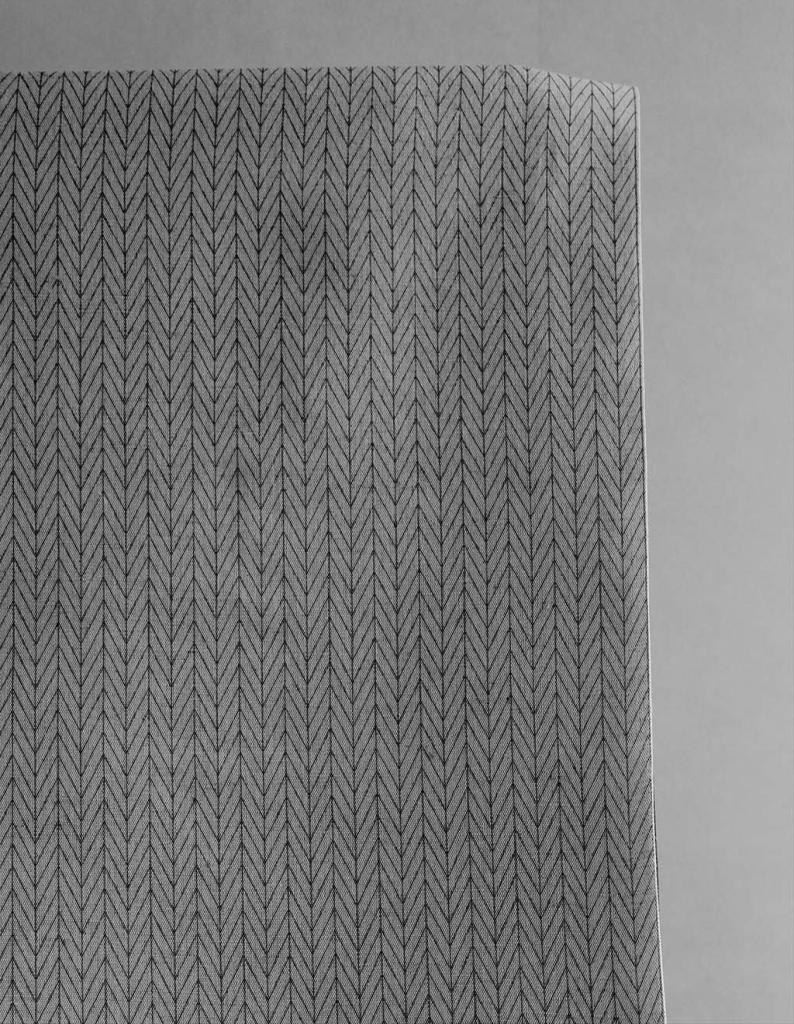 Ollie Noir Curtain fabric, abstract black herringbone pattern