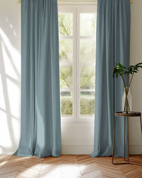 Pair of made to measure blue cotton curtains in Amara Blue Fog fabric