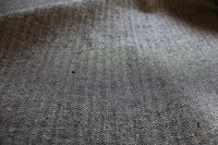 Edda Noir - Black and white Herringbone fabric for curtains, close-up