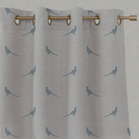 Blue Kids Linen Eyelet Curtains - Pheasant True Blue - Natural base fabric.