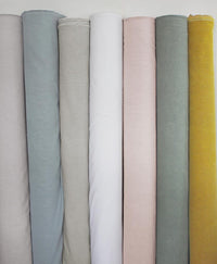 Subtle Warm Blue - Pre-washed linen upholstery fabric. Ideal for warm curtains and blinds.