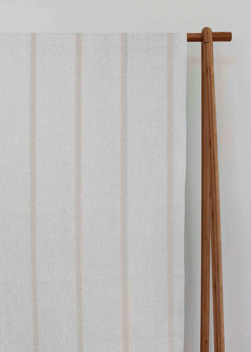 Rune Grey Sand - vertical grey tone striped fabric.