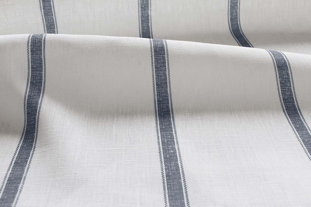 Rune Ink - vertical blue tone striped fabric.