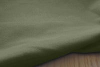 Close-up shot of this ivy green 100% Cotton fabric