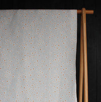 Janika Tangerine - Linen curtain fabric - Orange flower print on Grey background