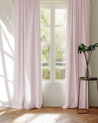 Pink pair of curtains made of Amara Pale Rose fabric