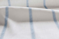 Rune Agate Blue - vertical blue tone striped fabric.