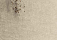 Natural 100% linen fabric - Close-up shot of the material.