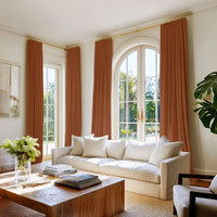 Two pairs of Burnt Orange cotton curtains located in a contemporary living room