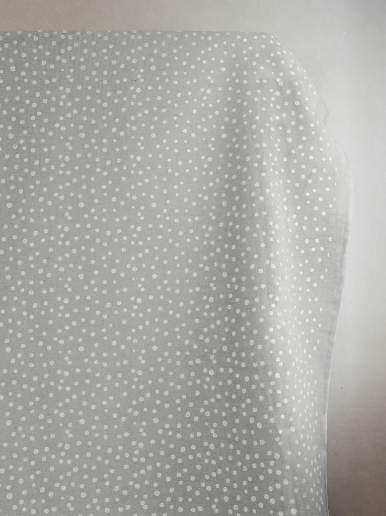Dottie White - Natural fabric with white dots
