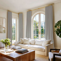 Living room with two pairs of Grey 100% Cotton curtains made of Amara Grey Cloud fabric