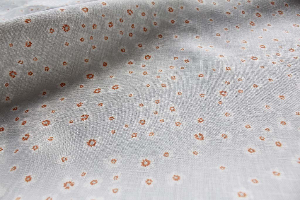 Janika Tangerine - Linen curtain fabric - Orange flower print on Grey background