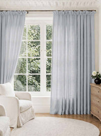 Light Blue Pleated Linen curtains for Living room. Made of pre-washed linen Bianco Pale Blue by Ada & Ina.