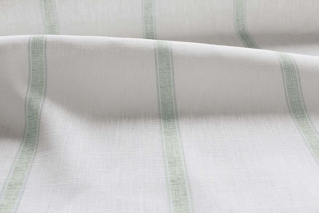 Rune Meadow - vertical Green tone striped fabric.