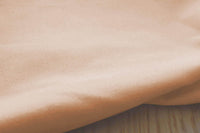 Amara Peony Powder - Muted Pink Cotton fabric, close-up photo of weave