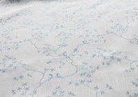 Goldfinch Shadow Blue WHT- Curtain fabric with botanical print